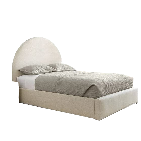 Beige upholstered bed in a modern bedroom with light gray walls and white curtains.