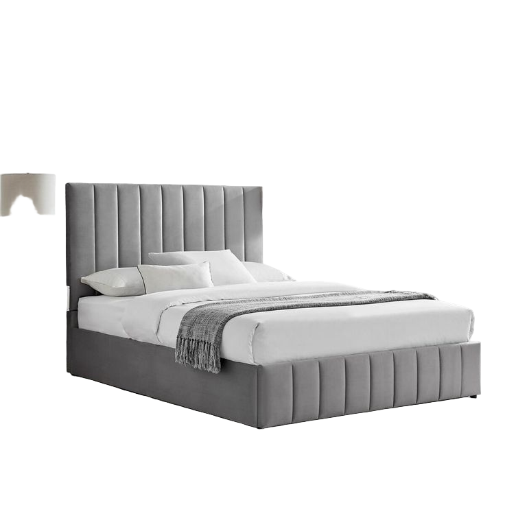 Gray upholstered bed in a modern bedroom with white walls and large windows.
