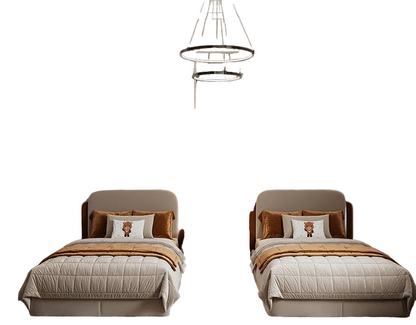 Two beds with matching bedding and pillows on a white background