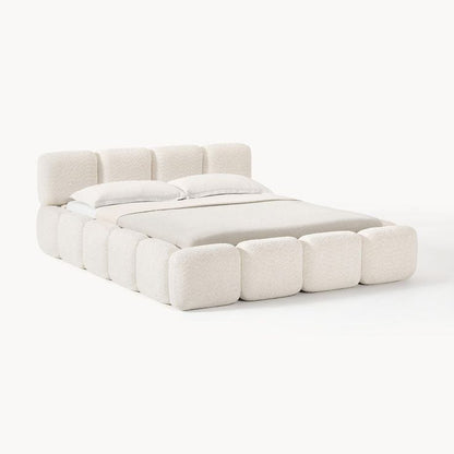 Modern bed with geometric design on a white background