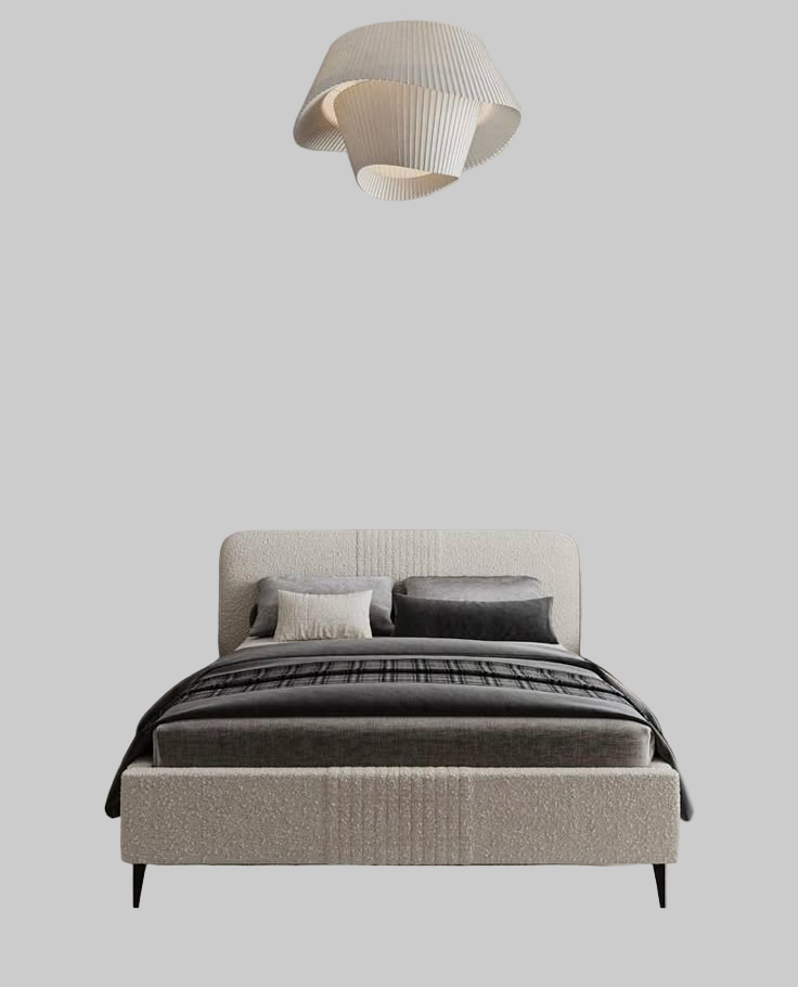 Modern bedroom with a bed, nightstands, and abstract wall art.