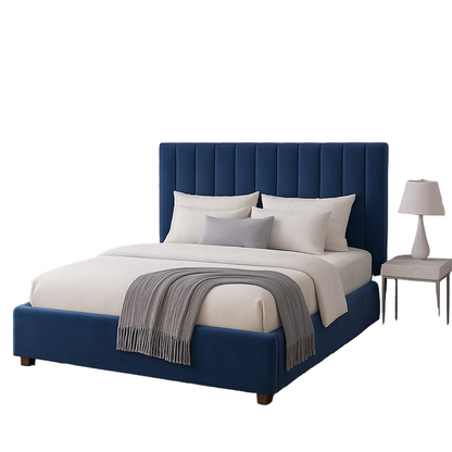 Blue upholstered bed with white bedding in a stylish bedroom.