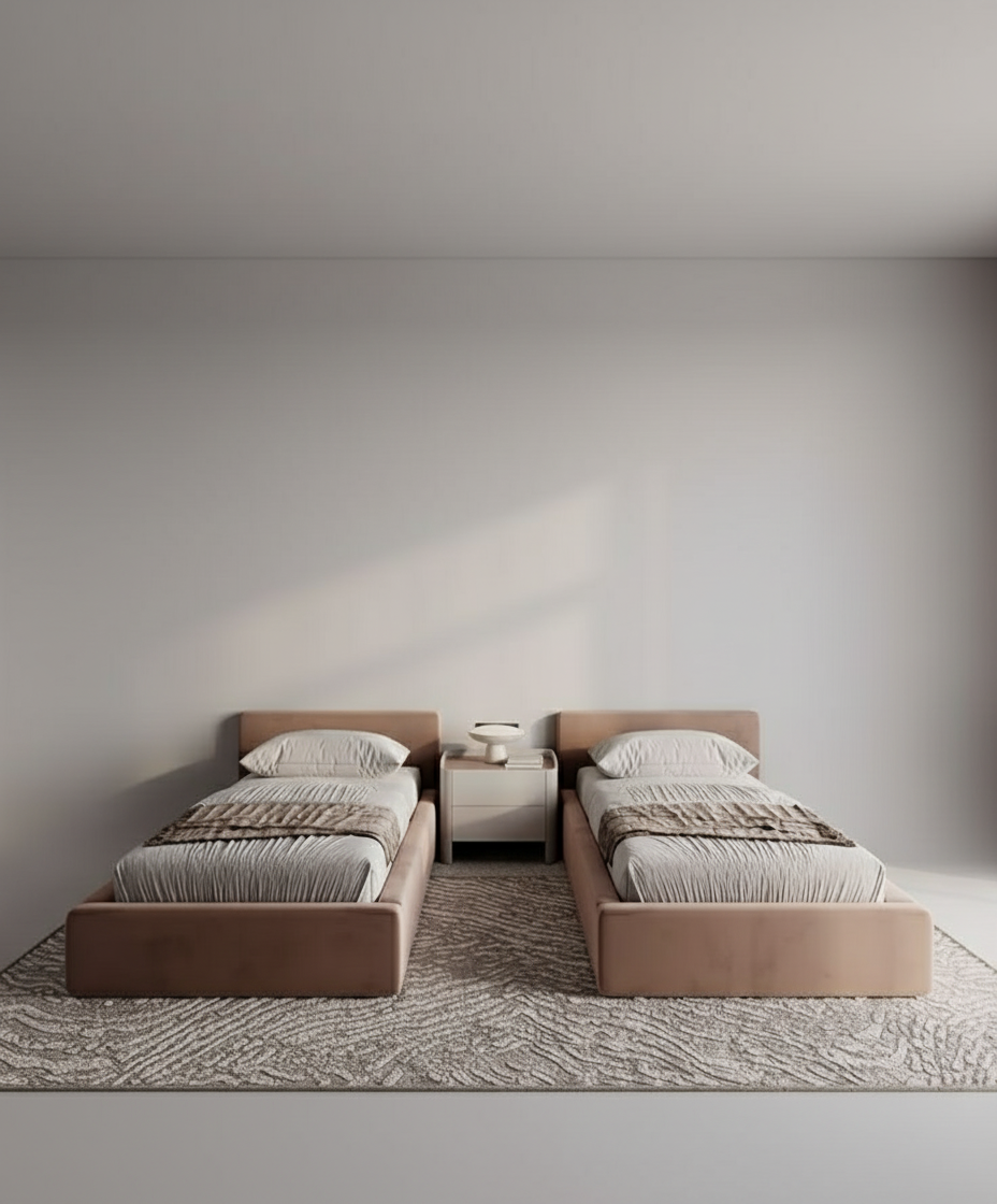 Modern bedroom with two beds against a wall with built-in lighting.