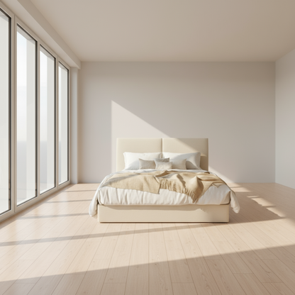 Neatly made bed in a bedroom with a chandelier, lamps, and neutral decor.