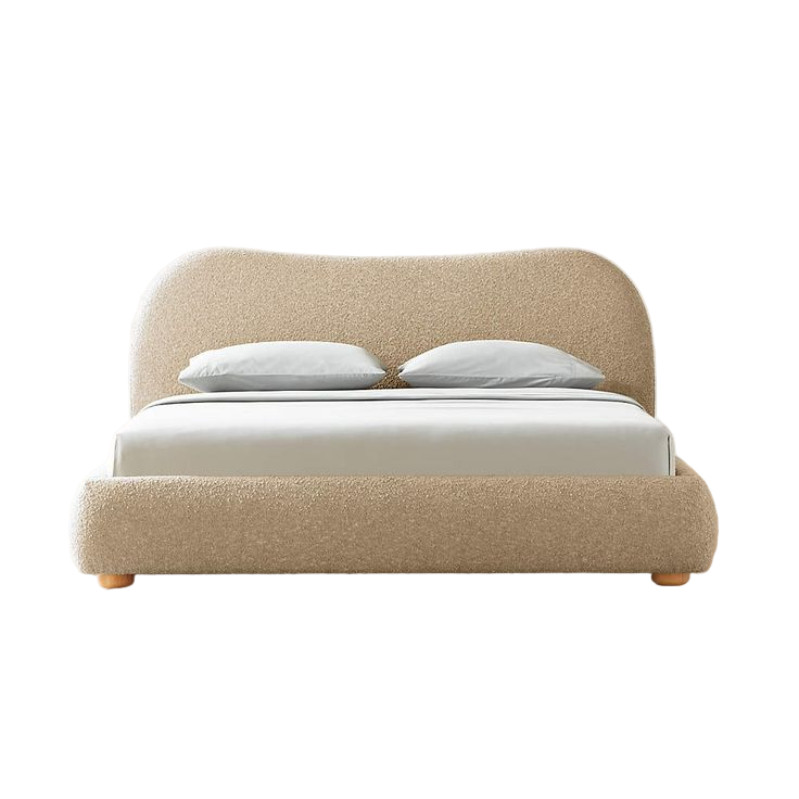 Beige upholstered bed with white bedding on a wooden floor.