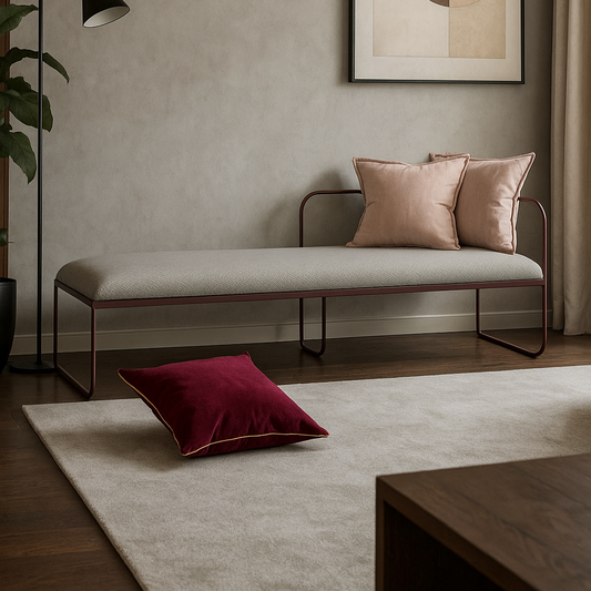 Modern living room with a bench, pillows, and abstract art on the wall.