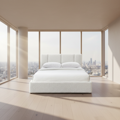 White upholstered bed with a tufted headboard on a white background