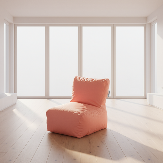 Pink bean bag chair on a light gray background