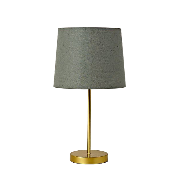 Table lamp with a gray shade and gold base on a white brick wall background
