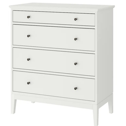 White dresser with four drawers on a white background